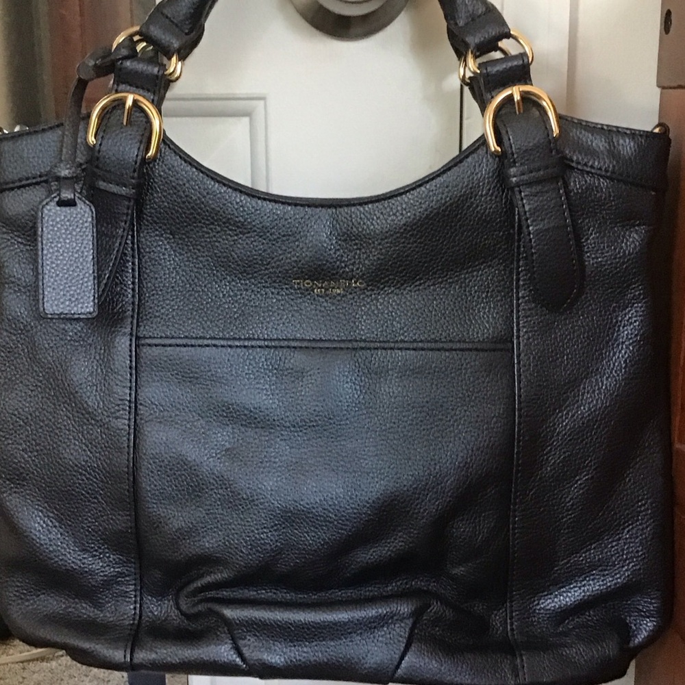 Tignanello Blue iridescent Leather Shoulder Bag with Gold Accents never used.